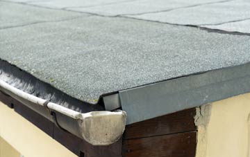 repair or replace Llowes flat roofing?